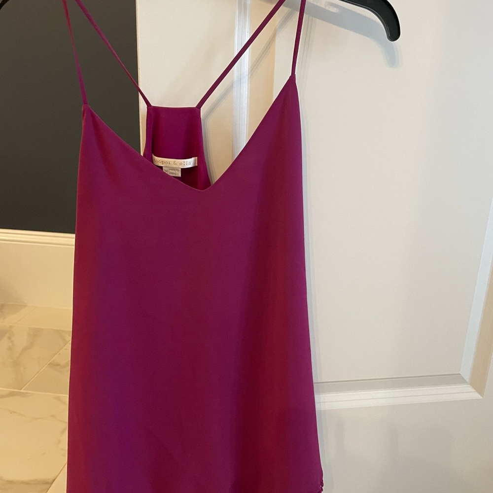 Cute light weight top. Razor back style with thin straps